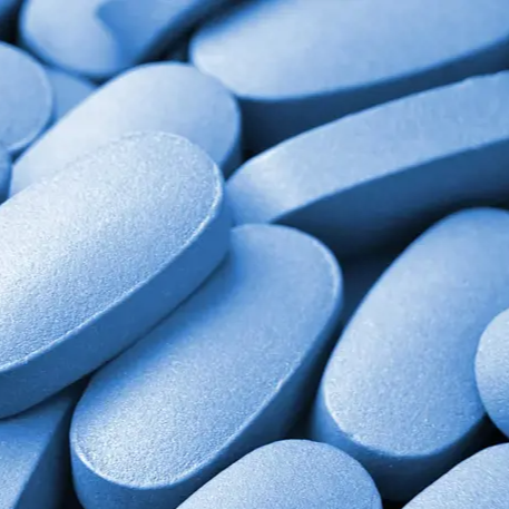 Bottle of LyfeR X Sildenafil on a light blue background